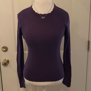 Harold’s purple silk sweater with beads